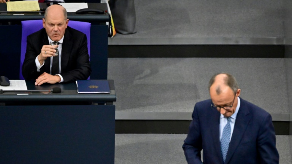 Scholz fordert Merz zu Unterstützung von EU-Asyl-Gesetz im Bundestag auf