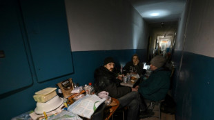 Survivors of Russian bombings cling on in flattened flats