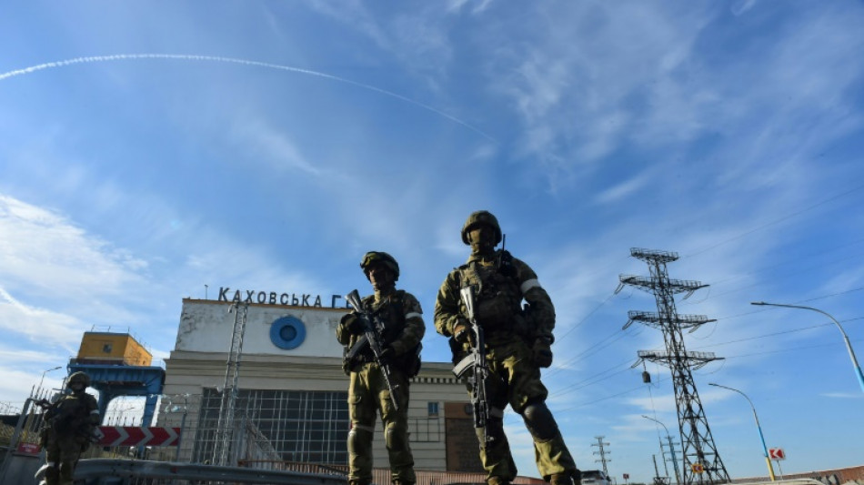 In southern Ukraine, Russian forces guard strategic dam