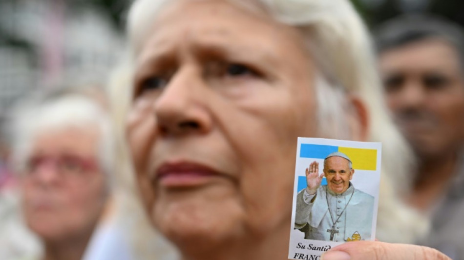 Ailing pope works on canonisations as Catholics pray for recovery