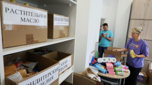 In Moscow, volunteers gather aid as thousands flee border