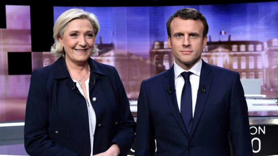 Macron warned against complacency ahead of Le Pen duel