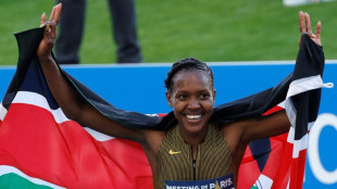 Kipyegon ready for Olympic double after improving 1500m world record