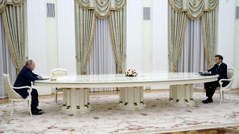 Long shot: Putin's giant table sparks jokes -- and speculation