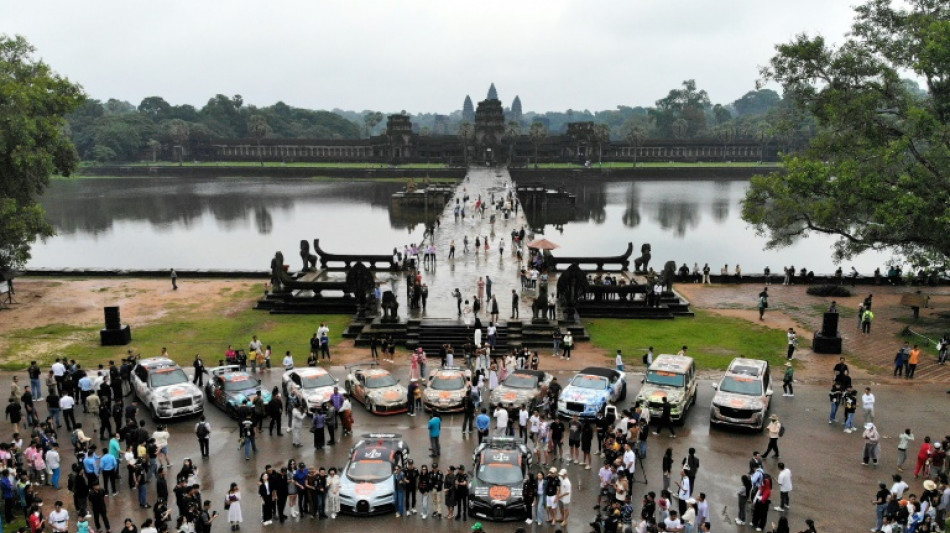 Supercars line up at Cambodia's Angkor Wat temples