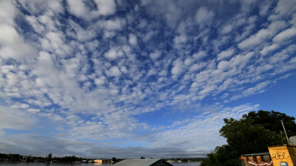 Australians flee floods as toll rises to 12, Sydney on alert