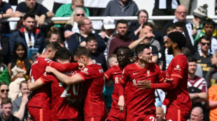 Liverpool pile pressure on City as Norwich are relegated