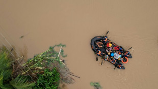 14 dead, thousands evacuated as tropical storm batters Philippines