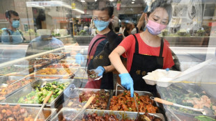 Cheap mealboxes a taste of Hong Kong's economic woes