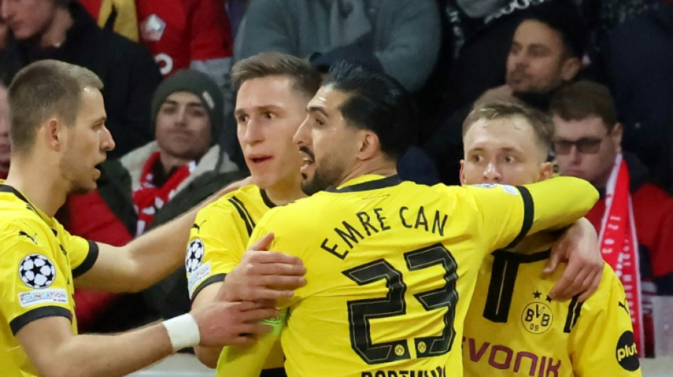 Dortmund fight back to beat Lille and reach Champions League quarters