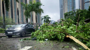 Typhoon Saola weakens but still a threat in southern China