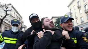 Police break up Georgia vote protest as president mounts court challenge