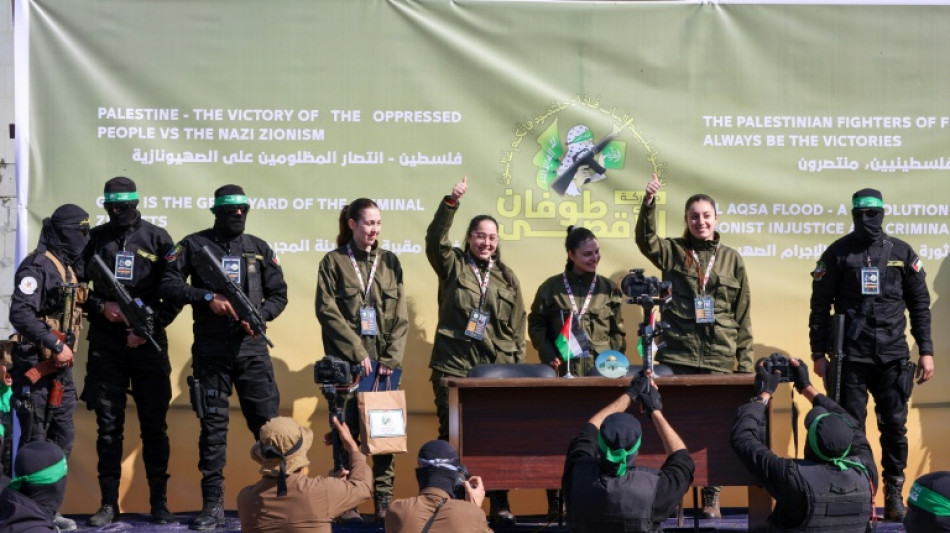 Hamas parades Israeli hostages at slick ceremony before release