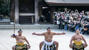 Crowds welcome sumo's newest grand champion in ancient ceremony