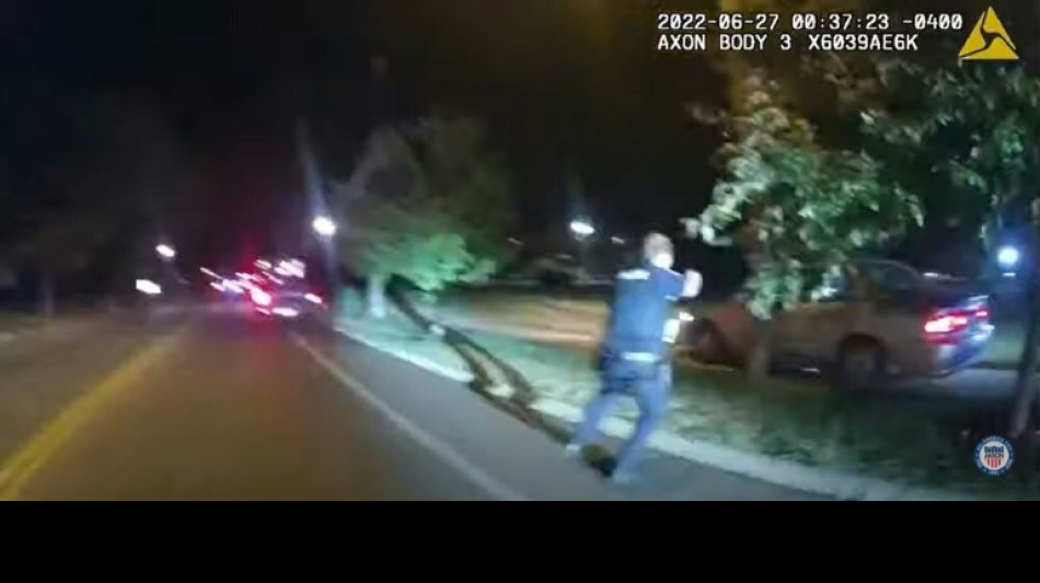 US officials urge calm after releasing video of police killing Black man