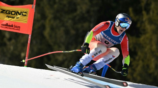 Odermatt delivers super-G masterclass for third world gold