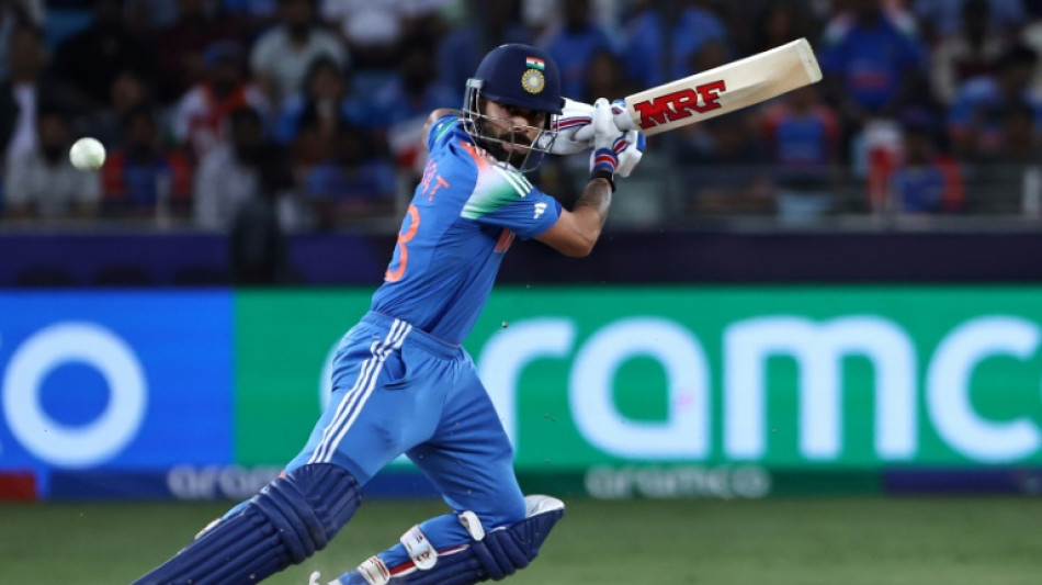 Kohli leads India to Champions Trophy final with victory over Australia 