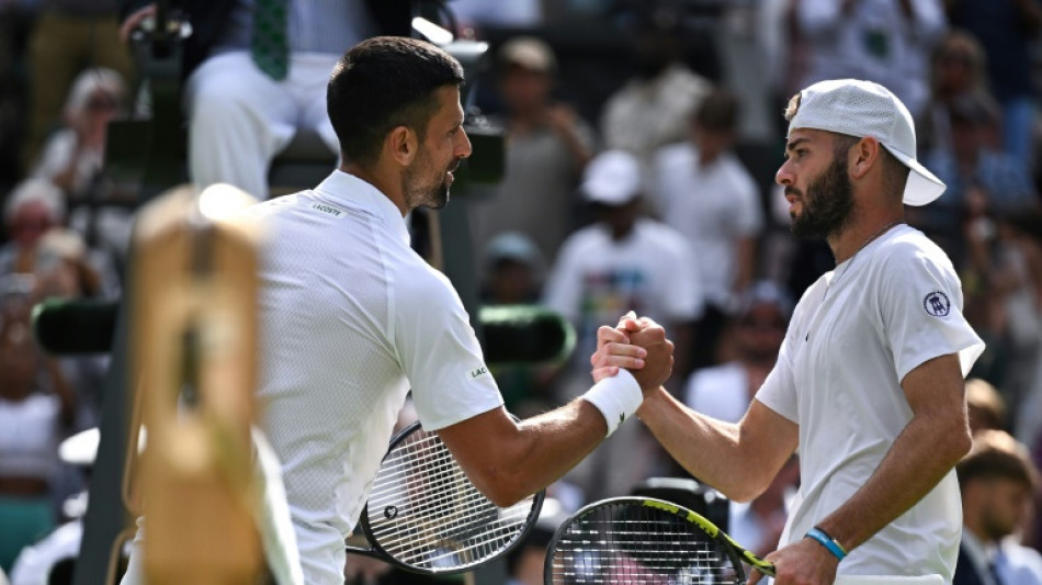Djokovic survives rookie test as Wimbledon craves Murray magic