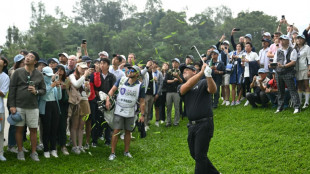 Former Masters champion Reed wins Hong Kong Open