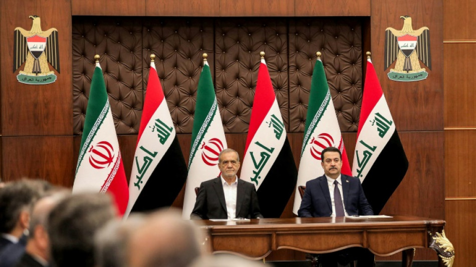 Iran president deepens Iraq ties on first foreign trip