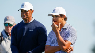 Tiger Woods and son Charlie share halfway lead in family event