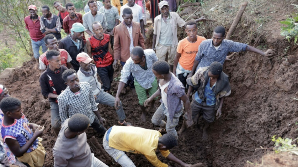 Tearful locals search in mud for Ethiopia landslide victims