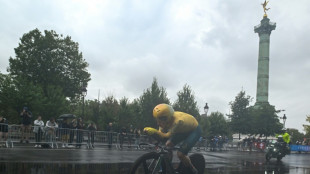 Australia's Brown defies the rain to win Olympic time-trial gold