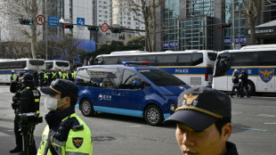 South Korea's president in court as investigators seek to extend detention