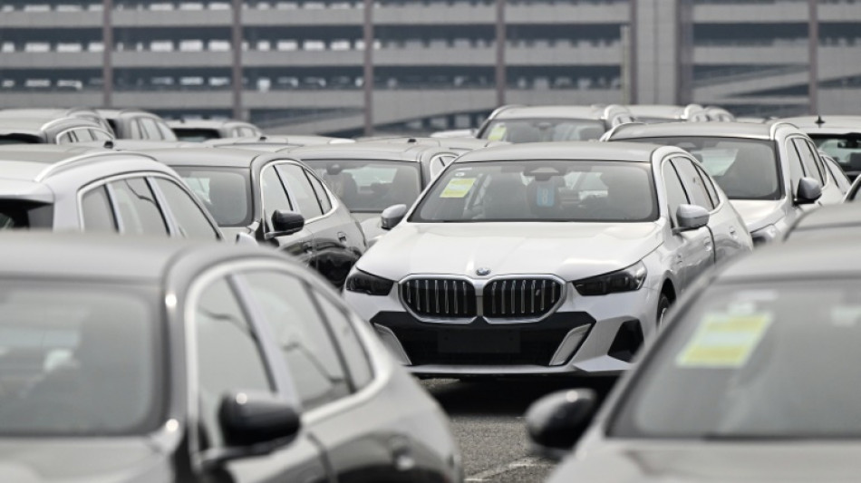 BMW warns on tariffs, China as 2024 profits plunge